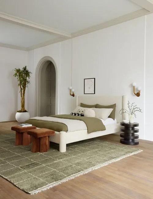 Modern Bedroom with Arched Doorway & Olive Green Rug